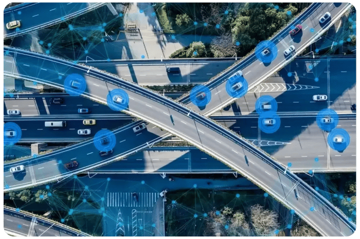 Aerial highway view of connected vehicles depicting telematics data - rounded corners Aerial highway view of connected vehicles depicting telematics data - rounded corners