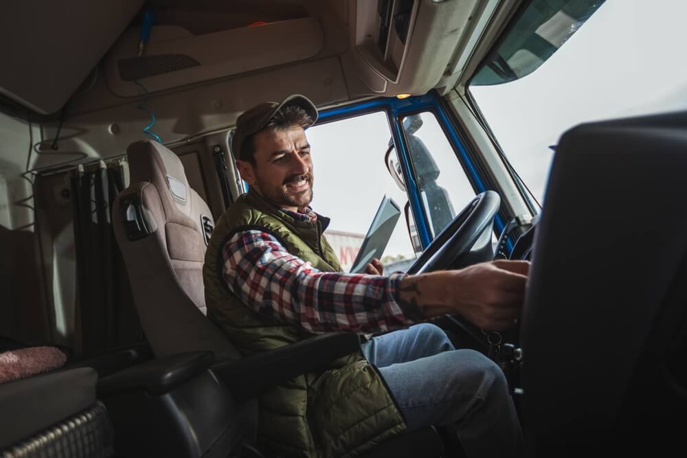 image of distracted fleet driver, showing the importance of following distracted driving safety tips