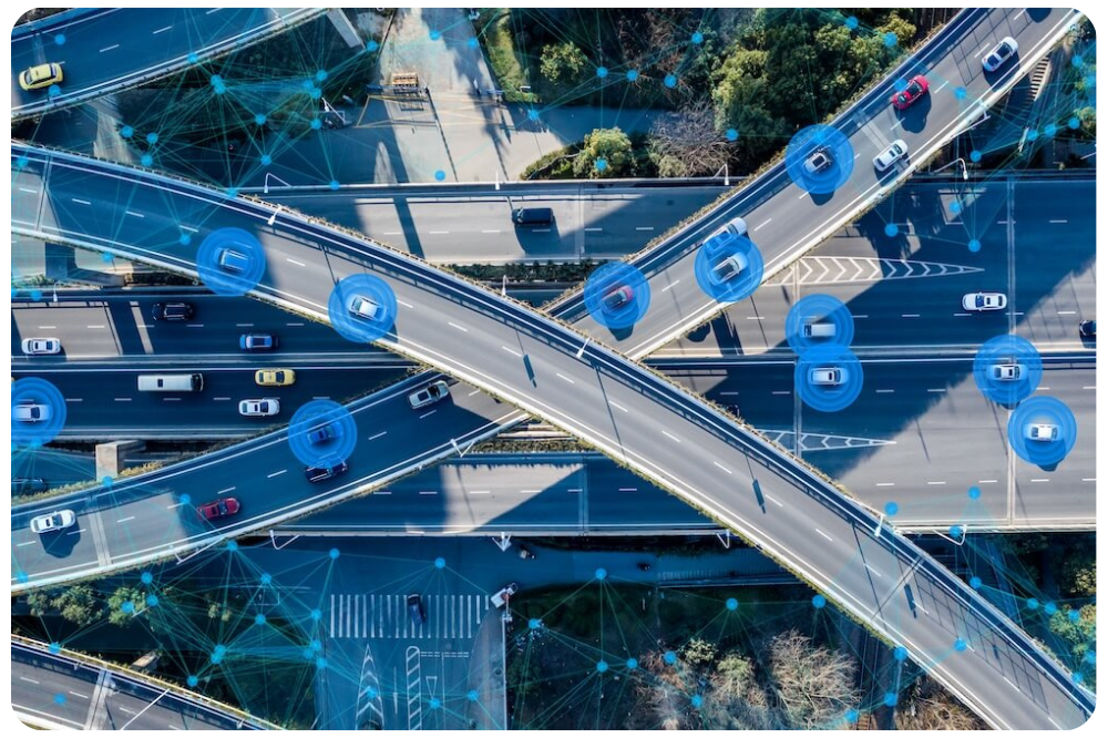 Aerial highway view of connected vehicles depicting telematics data - rounded corners Aerial highway view of connected vehicles depicting telematics data - rounded corners