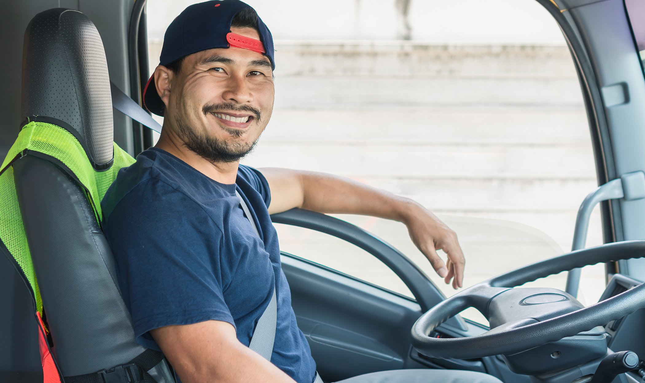 image of happy company driver showing the value of strong driver retention strategies