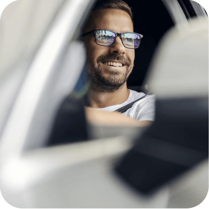Sharing economy driver behind the wheel of a car Sharing economy driver behind the wheel of a car