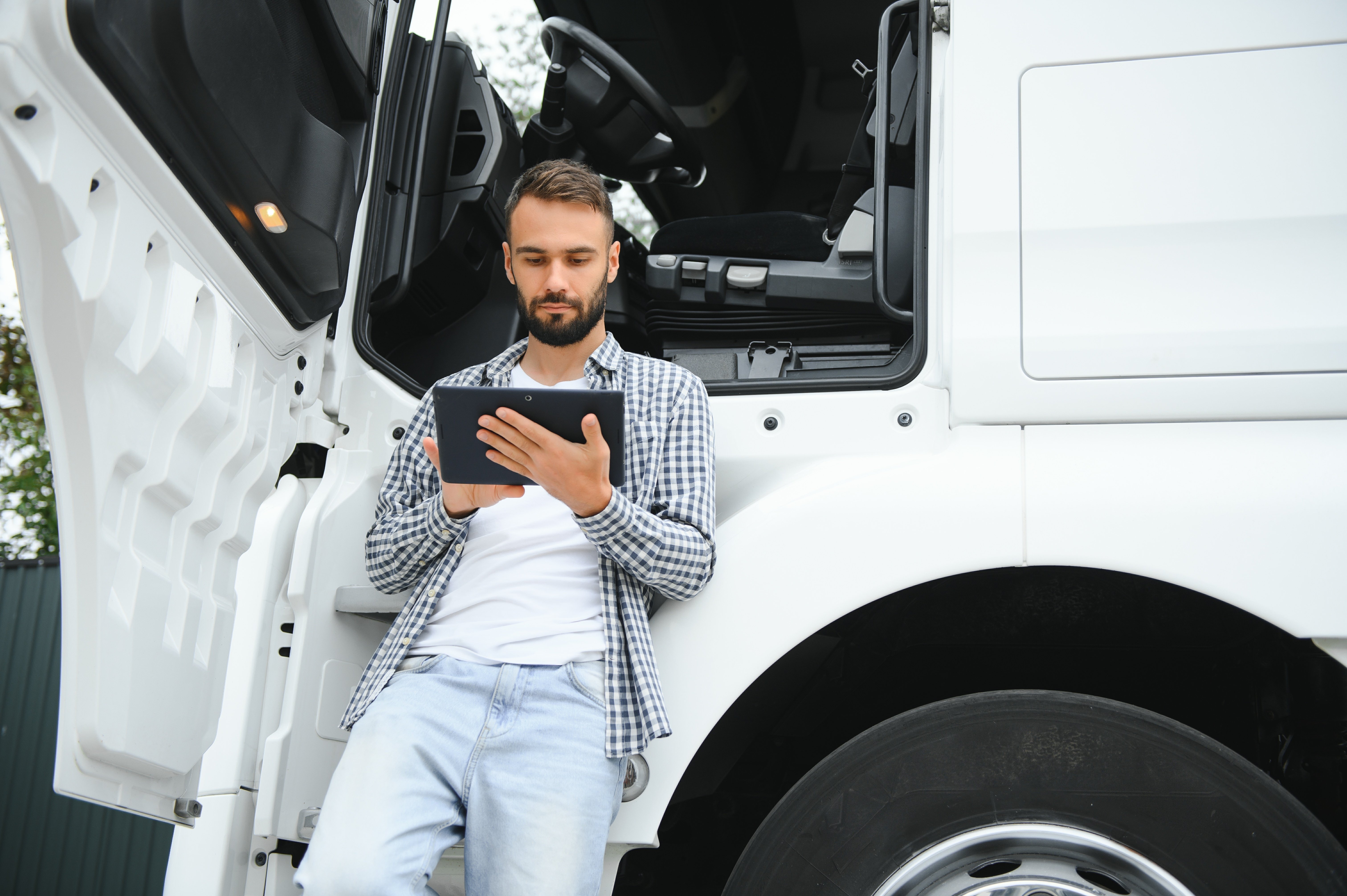 Photo of a truck driver completing his English Proficiency Requirements training