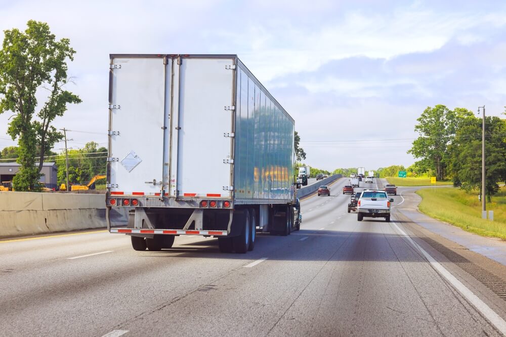 images of vehicle on rising road representing increasing fleet insurance costs